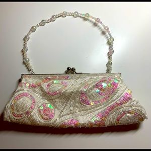 4/$25 Evening bag can be used with or without the strap